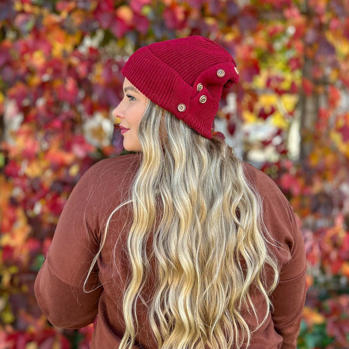 red sprite hats hidden ponytail beanie. side view of maroon button up beanie for high ponytail and messy bun