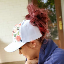 Load image into Gallery viewer, side view of white floral messy bun baseball cap red sprite hats easy hat updos
