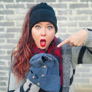 girl showing dark grey button up beanie with all functional buttons top opening and wearing black button up beanie with high ponytail