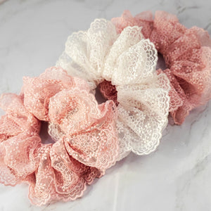 white and light pink lace fancy scrunchies in a row red sprite hats