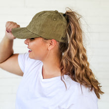 Load image into Gallery viewer, side view of red sprite hats military green relaxed fit messy bun baseball cap with curly high ponytail
