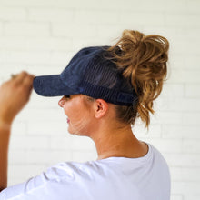 Load image into Gallery viewer, side view of red sprite hats dark blue mesh back messy bun baseball cap hat with a high messy bun hat that adapts
