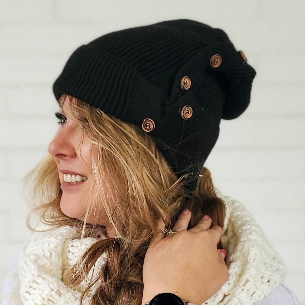 black button up beanie with long messy side braid  red sprite hats