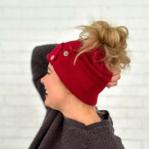 side view of maroon beanie with button up detail. better than cc ponytail beanie for long hair red sprite hats
