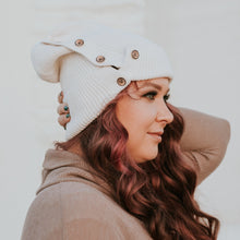 Load image into Gallery viewer, light cream red sprite hats button up beanie with long curly hair
